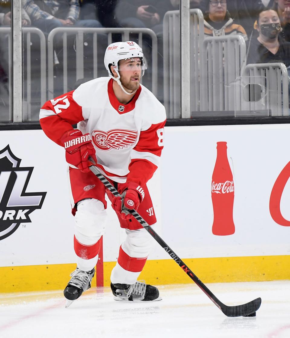 Detroit Red Wings defenseman Jordan Oesterle (82) controls the puck during the third period against the Boston Bruins at TD Garden on Nov. 4, 2021.