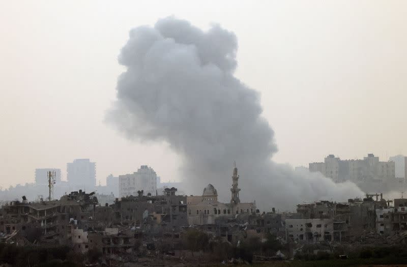 Smoke is rising after an Israeli strike on Gaza seen from a viewpoint in Southern Israel