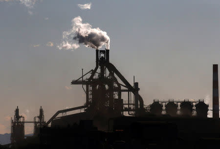 Chimneys of a steel factory are pictured at an industrial area in Kawasaki, Japan, January 16, 2017. REUTERS/Kim Kyung-Hoon