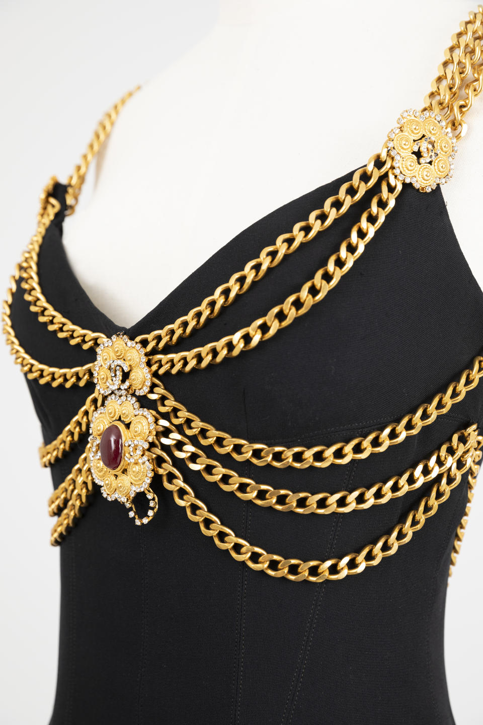 A silk dress with chains from the summer 1992 <a href="https://wwd.com/beauty-industry-news/beauty-features/inside-chanels-integrative-beauty-1235928345/" rel="nofollow noopener" target="_blank" data-ylk="slk:Chanel;elm:context_link;itc:0;sec:content-canvas" class="link ">Chanel</a> haute couture collection.