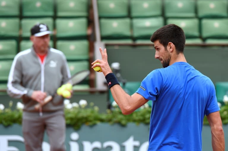 Novak Djokovic trains with his coach Boris Becker at the 2016 French Open