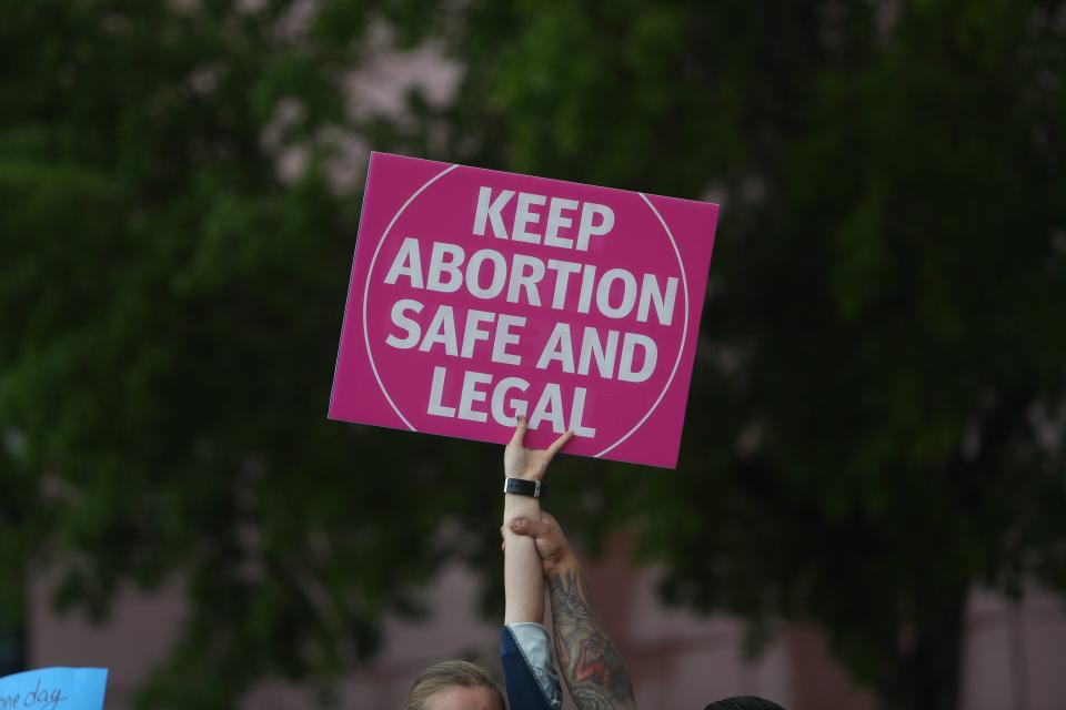 Supporters and opponents of abortion rights were present at a protest in downtown Fort Myers on Tuesday, May 3, 2022. Members for abortion rights held the protest in response to a leaked draft opinion from the Supreme Court seeking to overturn Roe v. Wade. 