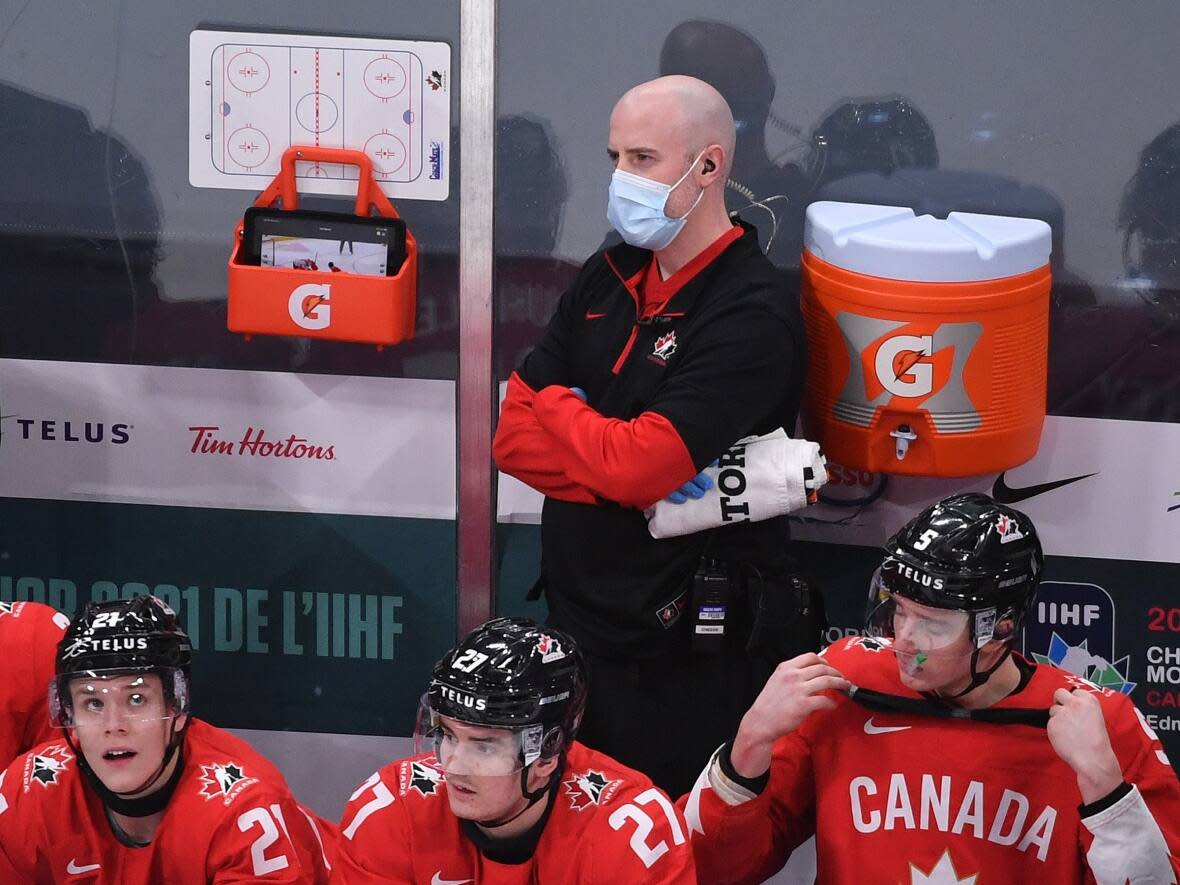 Brian Cheeseman, seen here at the 2021 world junior hockey championship, will be an athletic trainer with the the Canadian men's Olympic hockey team in Beijing.  (Submitted by Brian Cheeseman - image credit)