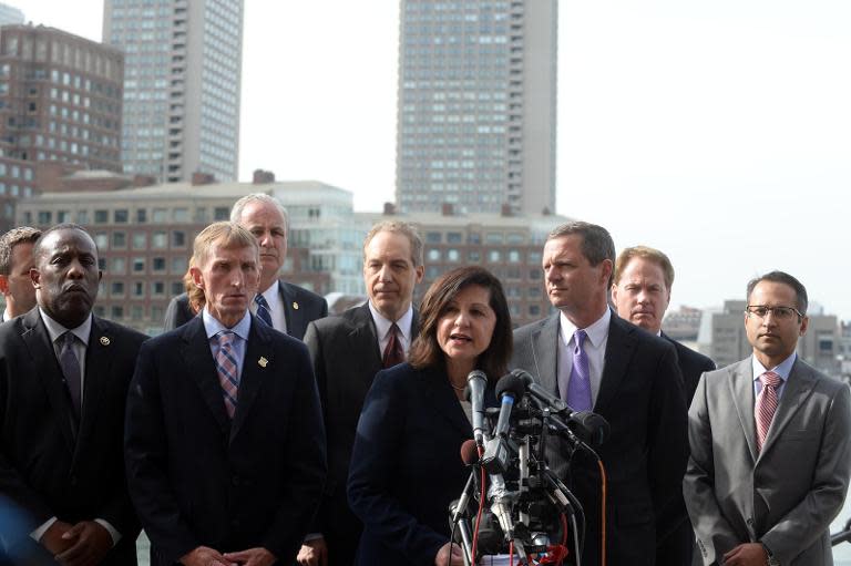 US Attorney Carmen Ortiz for Massachusetts speaks to the media outside the John Joseph Moakley United States Courthouse May 15, 2014