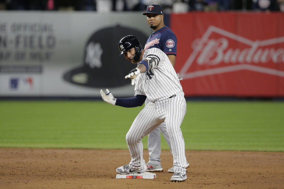 New York Yankees' Gleyber Torres reacts after driving in two runs against the Minnesota Twins during the fifth inning of Game 1 of an American League Division Series baseball game, Friday, Oct. 4, 2019, in New York. (AP Photo/Seth Wenig)