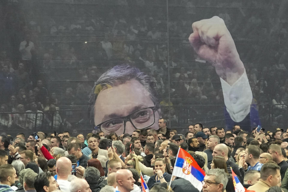 An image of Serbian President Aleksandar Vucic is seen during a pre-election rally of his ruling Serbian Progressive Party in Belgrade, Serbia, Saturday, Dec. 2, 2023. When Serbia formally opened membership negotiations with the European Union, back in 2014, it was a moment of hope for pro-Western Serbs, eager to set their troubled country on an irreversible path to democratization. Those days are long gone. Now, they feel betrayed, both by the government and the EU. (AP Photo/Darko Vojinovic)