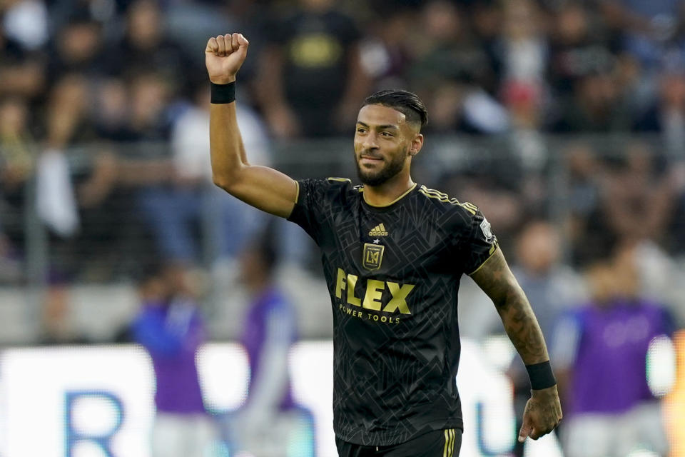 Los Angeles FC forward Denis Bouanga celebrates after scoring against the Vancouver Whitecaps during the first half of an MLS playoff soccer match Saturday, Oct. 28, 2023, in Los Angeles. (AP Photo/Ryan Sun)