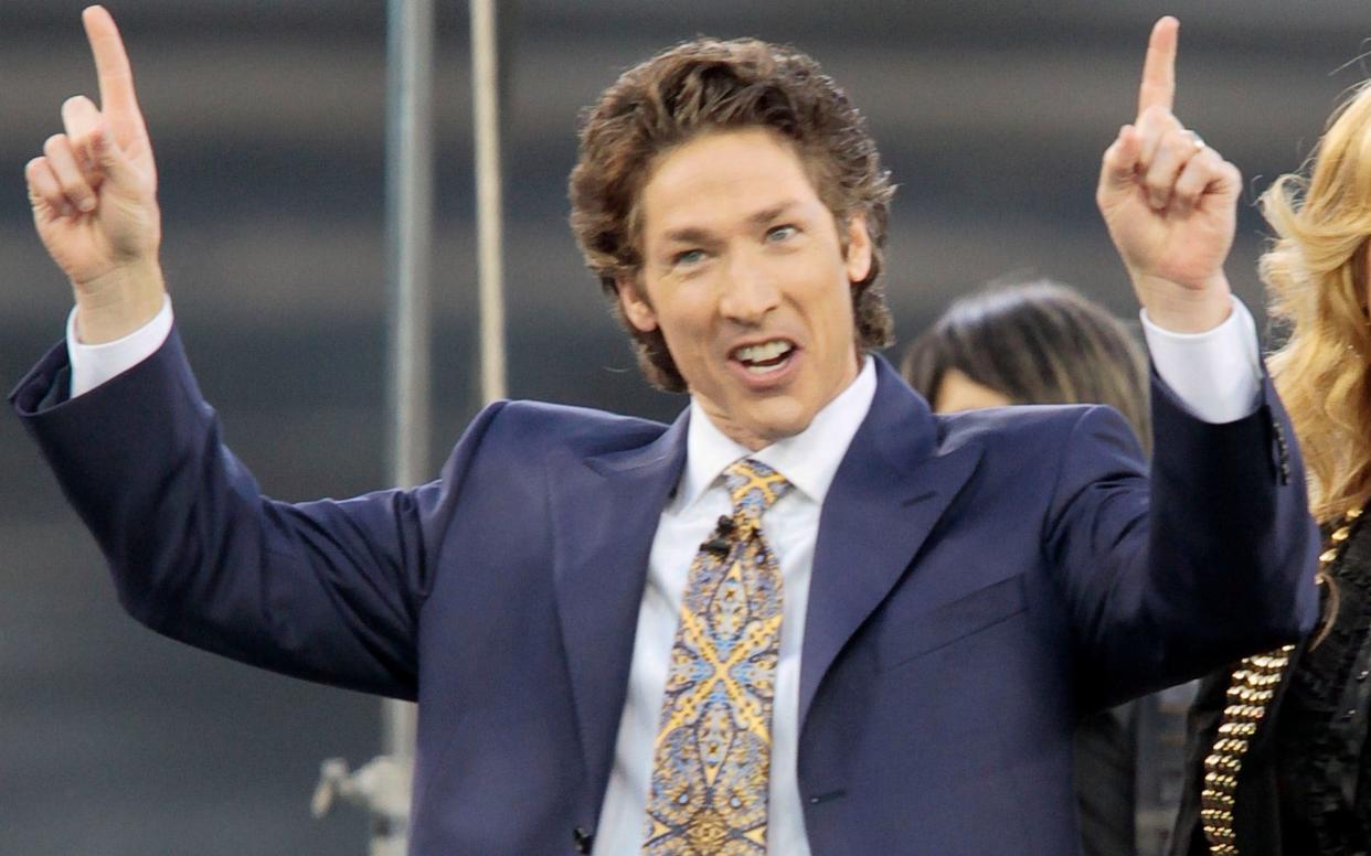 This April 24, 2010 file photo shows Lakewood Church pastor Joel Osteen at Dodger Stadium during his