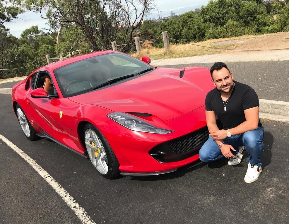 Sam Bashiry in front of his Ferrari.