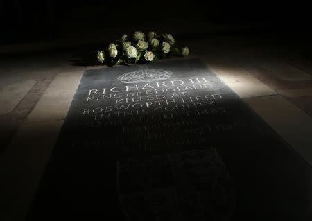 Light falls on a stone refering to King Richard III at Leicester Cathedral, central England, February 4, 2013. REUTERS/Darren Staples