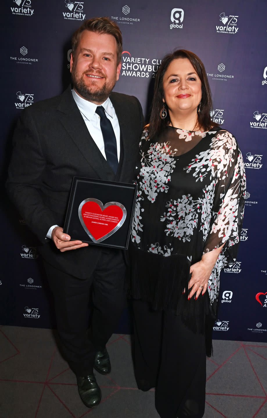 james corden with his award for outstanding global achievements in broadcasting, acting and comedy standing with ruth jones at the variety club awards