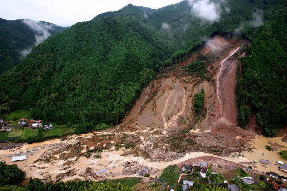 <p>In this aerial image, a landslide swamps Ono area after the torrential rain on July 6, 2017 in Hita, Oita, Japan. (Photo: The Asahi Shimbun via Getty Images) </p>