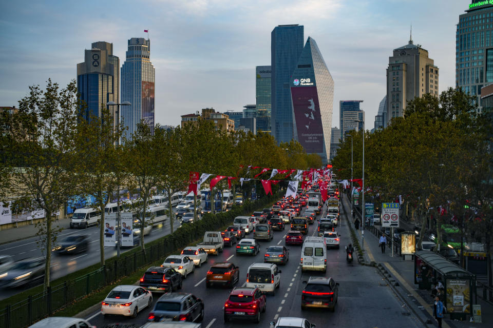 A poster of Mustafa Kemal Ataturk to commemorate the 100 year anniversary of modern Turkey on a commercial tower, in Istanbul, Turkey, Wednesday, Oct. 25, 2023. The Turkish Republic, founded from the ruins of the Ottoman Empire by the national independence hero Mustafa Kemal Ataturk, turns 100 on Oct. 29. Ataturk established a Western-facing secular republic modeled on the great powers of the time, ushering in radical reforms that abolished the caliphate, replaced the Arabic script with the Roman alphabet, gave women the vote and adopted European laws and codes. (AP Photo/Emrah Gurel)