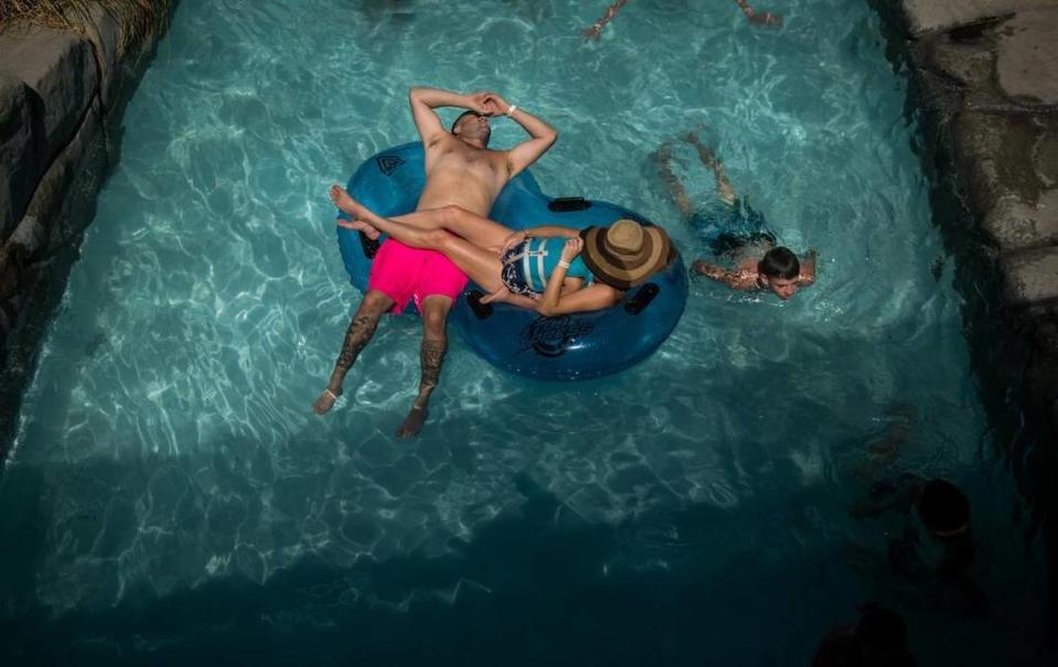 Park-goers float down the “Lazy River” at Raging Waters water park on Wednesday, July 28, 2015, in Sacramento, Calif.