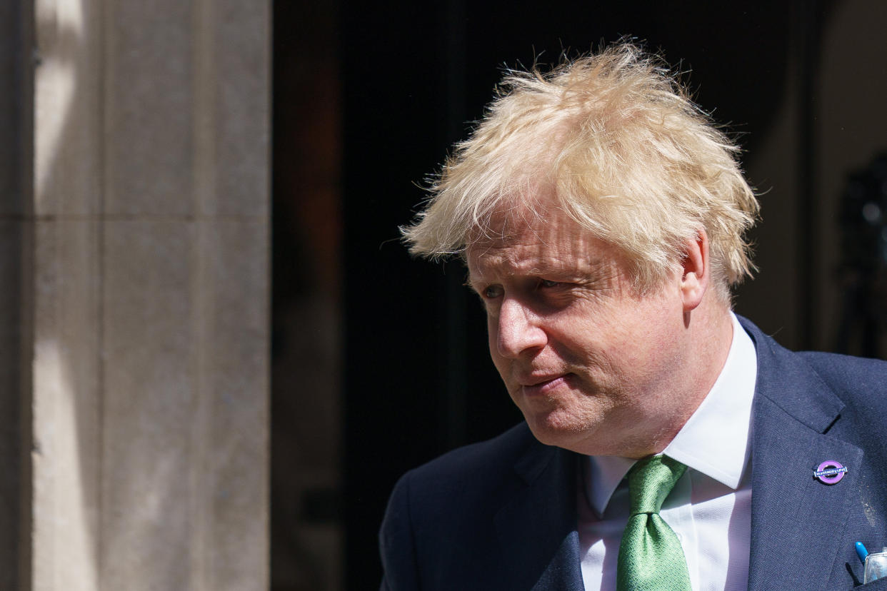 Prime Minister Boris Johnson departs 10 Downing Street, Westminster, London, to attend Prime Minister's Questions at the Houses of Parliament. Picture date: Wednesday May 18, 2022.