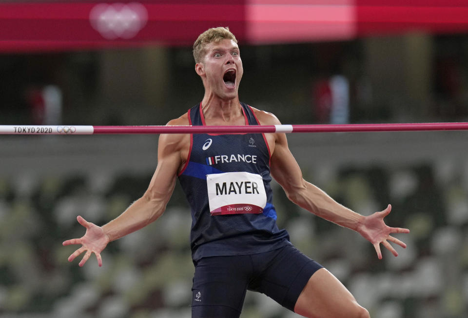 <p>Kevin Mayer, of France celebrates making a clearance in the decathlon high jump at the 2020 Summer Olympics, Wednesday, Aug. 4, 2021, in Tokyo. (AP Photo/Francisco Seco)</p> 