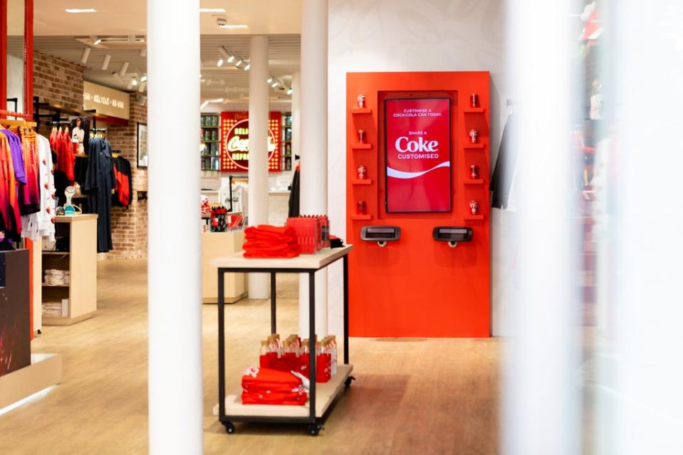 The Coca-Cola can customisation station inside the new Covent Garden store (Coca-Cola)
