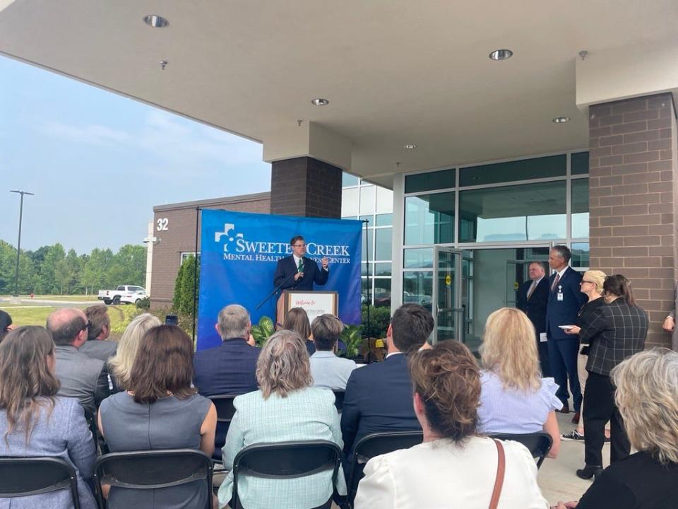 North Carolina Department of Health and Human Services Secretary Kody Kinsley speaks at the ribbon cutting for the Sweeten Creek Mental Health and Wellness Center July 18.