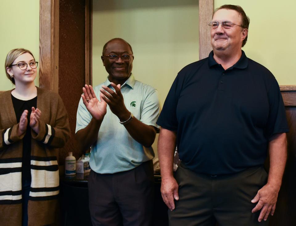 Retired BWL project engineer Ray Phillipich, right, a self-described "history buff" is acknowledged Friday, Aug. 5, 2022, during a special ceremony at BWL's REO Depot in REO Town. His research was instrumental in the time capsule's discovery.