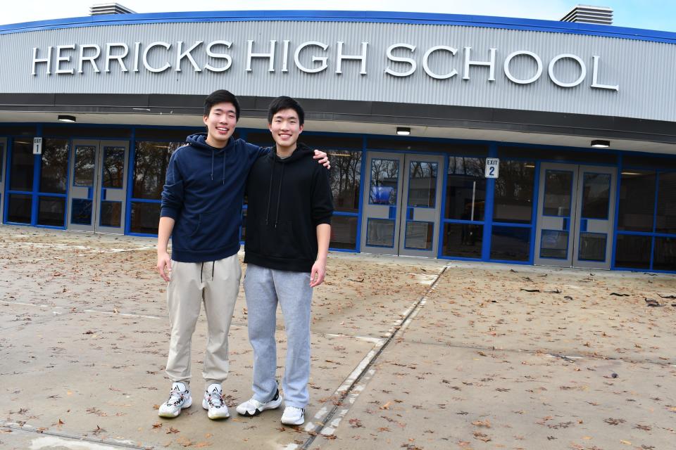 Twins Devon (left) and Dylan (right) Lee. The brothers are graduating from Herricks High School in June as valedictorian and salutatorian.