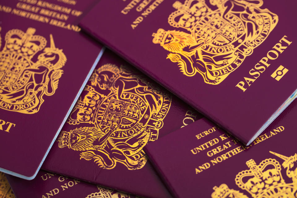 London, England - August 30, 2016: An editorial stock photo of a collection of British Passports. Photographed isolated on a white background. Photographed using the Canon EOS 5DSR