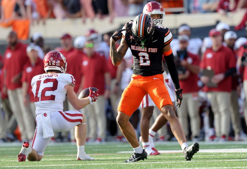 OSU's Korie Black (2) celebrates a defensive stop next to OU's Drake Stoops (12) during the Cowboys' win in Bedlam on Nov. 4, 2023, in Stillwater.