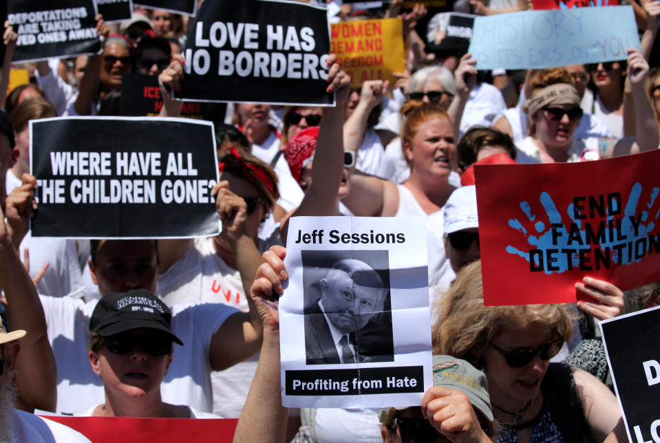 <p>A demonstrator holds an image of U.S. Attorney General Jeff Sessions as hundreds of women and immigration activists march as part of a rally calling for “an end to family detention” and in opposition to the immigration policies of the Trump administration, in Washington, D.C., June 28, 2018. (Photo: Jonathan Ernst/Reuters) </p>