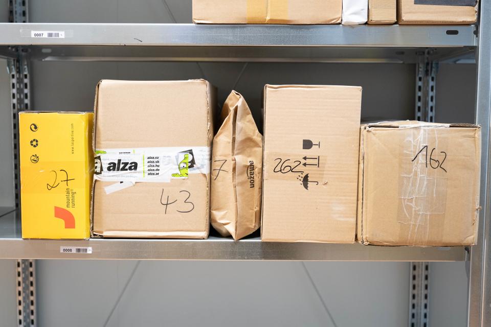 PRODUCTION - 11 June 2024, Saxony, Dresden: Parcels lie next to each other on a shelf. The Postal Act in Germany, which has been in force since 1998, is being comprehensively reformed. After lengthy negotiations, the traffic light coalition has agreed on changes. Photo: Sebastian Kahnert/dpa (Photo by Sebastian Kahnert/picture alliance via Getty Images)