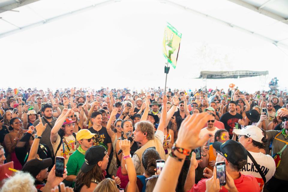 Caleb Chapman of Colony House walks through the crowd as he performs during the third day of Bonnaroo Music Festival in Manchester, Tenn. on Saturday, Jun. 17, 2023.