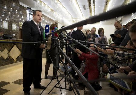 Organization for Security and Co-operation in Europe (OSCE) Chairperson-in-Office, Serbian Foreign Minister Ivica Dacic (L) addresses the media after a meeting of the so-called Contact Group in Minsk, Belarus, July 21, 2015. REUTERS/Vasily Fedosenko