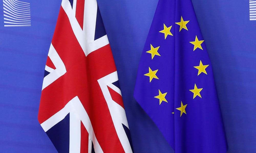 Flags at the EU commission ahead of a first full round of talks on Brexit