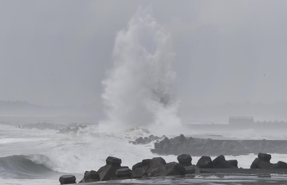 Large waves crash against the breakwaters as Typhoon Mawar approaches to Taiwan in Yilan County, eastern coast of Taiwan, Tuesday, May 30, 2023. Typhoon Mawar lashed Taiwan's eastern coast on Tuesday with wind, rains and large waves but largely skirted the island after giving a glancing blow to the northern Philippines. (AP Photo/Chiang Ying-ying)