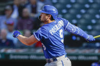 Kansas City Royals designated hitter Vinnie Pasquantino watches his solo home run off Cleveland Guardians starting pitcher Aaron Civale during the first inning of a baseball game, Wednesday, Oct. 5, 2022, in Cleveland. (AP Photo/Ron Schwane)