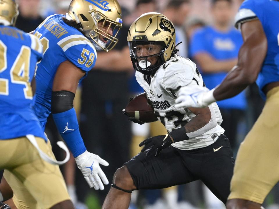 Colorado Buffaloes running back Jarek Broussard runs against the UCLA Bruins, Nov. 13, 2021 in Pasadena, Calif.