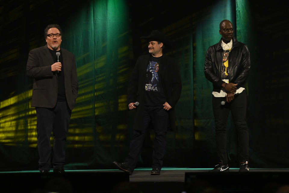 LONDON, ENGLAND - APRIL 07: Jon Favreau, Dave Filoni and Rick Famuyiwa onstage during the studio panel at Star Wars Celebration 2023 in London at ExCel on April 07, 2023 in London, England. (Photo by Kate Green/Getty Images for Disney)