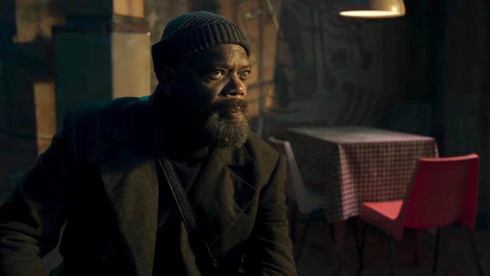 Samuel L. Jackson's Nick Fury sits while clad in all black with a winter hat and no eye patch on Secret Invasion