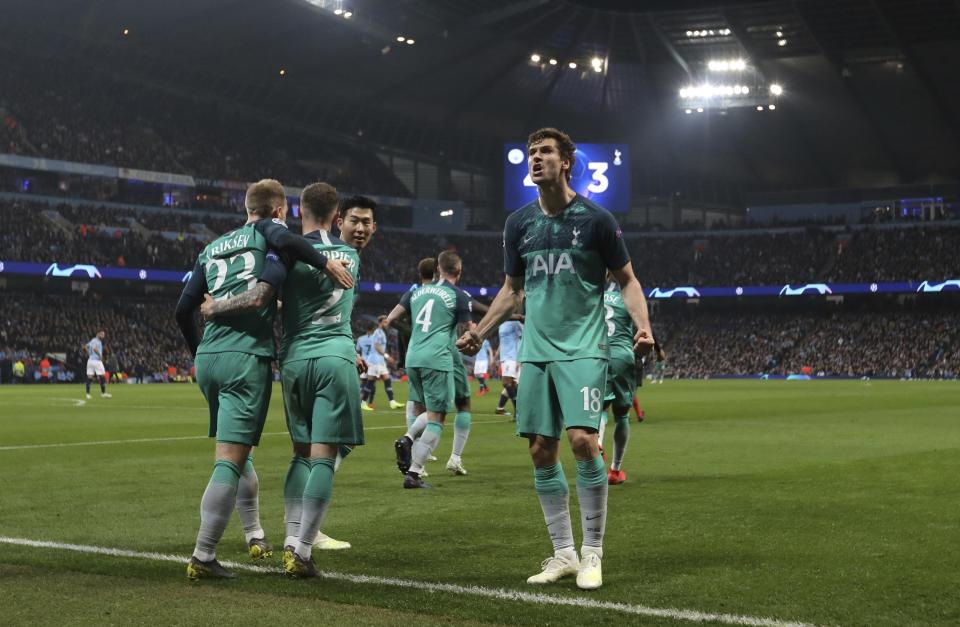 Tottenham Hotspur forward Fernando Llorente, right, celebrates his side's third goal with his teammates during the Champions League quarterfinal, second leg, soccer match between Manchester City and Tottenham Hotspur at the Etihad Stadium in Manchester, England, Wednesday, April 17, 2019. (AP Photo/Jon Super)