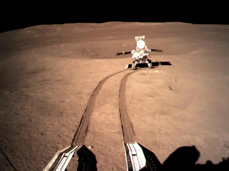 China's unmanned Yutu-2 rover, part of its Chang'e 4 lunar mission, rolls across the far side of the moon in January 2019.
