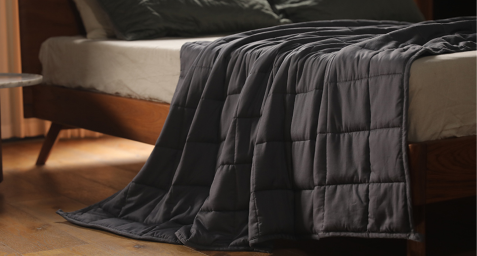 The YnM Cooling Weighted Blanket is a must for summer. Image via Amazon.