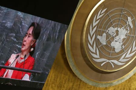 Myanmar's Minister of Foreign Affairs Aung San Suu Kyi is seen on a large screen as she addresses the 71st United Nations General Assembly in Manhattan, New York, U.S. September 21, 2016. REUTERS/Carlo Allegri