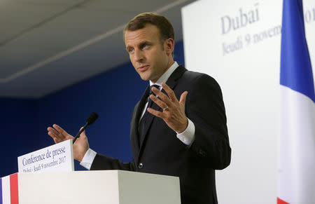 French President Emmanuel Macron gestures during a news conference in Dubai, UAE, November 9, 2017. REUTERS/Satish Kumar