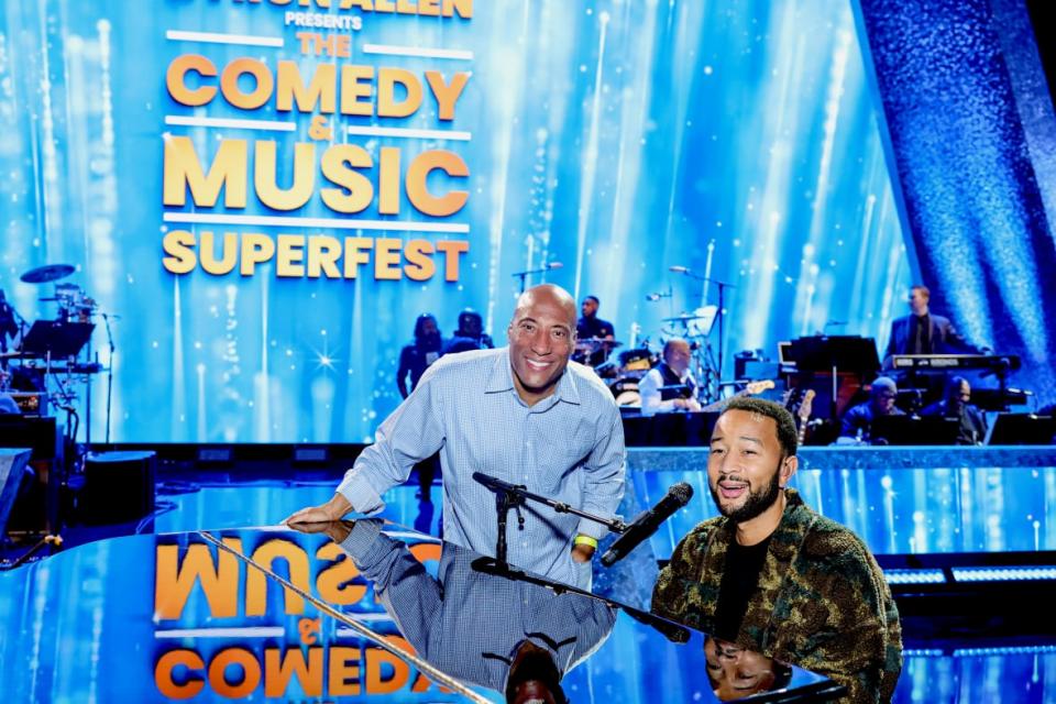 (Left to right) Byron Allen and John Legend pose for a portrait at “Byron Allen Presents: The Comedy & Music SuperFest” on Feb. 6, 2023 in Los Angeles. (Photo by Stefanie Keenan/Getty Images for Byron Allen, Allen Media Group)