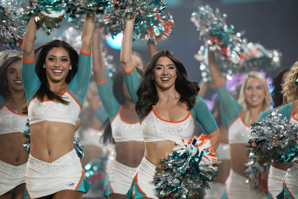 The Miami Dolphins cheerleaders perform during the first half of an NFL football game against the Buffalo Bills, Sunday, Jan. 7, 2024, in Miami Gardens, Fla. (AP Photo/Wilfredo Lee)
