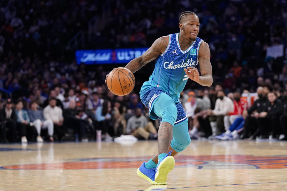 Charlotte Hornets guard Terry Rozier (3) drives to the net during the first half of an NBA basketball game against the New York Knicks, Monday, Jan. 17, 2022, in New York. (AP Photo/John Minchillo)