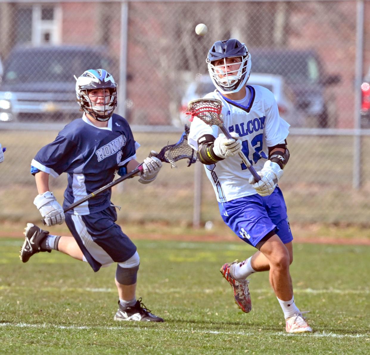 MASHPEE   04/13/22   Dominic Matteodo of Mashpee attempts to control the ball with Tamer Khalil of Monomoy.
