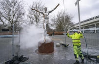 In this photo taken on Sunday, Dec. 22, 2019, the defaced statue of Zlatan Ibrahimovic is seen in Malmo, Sweden. The statue of Swedish soccer star Zlatan Ibrahimovic has been the target of more vandalism. This time, its nose has been chopped off. Ibrahimovic angered fans of his boyhood club, Malmo, last month when he bought a stake in one of its title rivals, Hammarby, and outlined his desire to make the Stockholm-based team “the best in Scandinavia.” (Johan Nilsson/TT News Agency via AP)