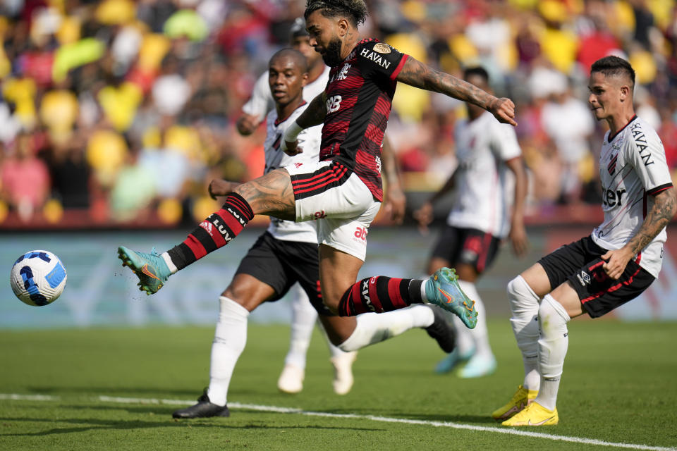 Gabriel Barbosa of Brazil's Flamengo scores the opening goal against Brazil's Athletico Paranaense during the Copa Libertadores final soccer match at the Monumental Stadium in Guayaquil, Ecuador, Saturday, Oct. 29, 2022. (AP Photo/Fernando Vergara)