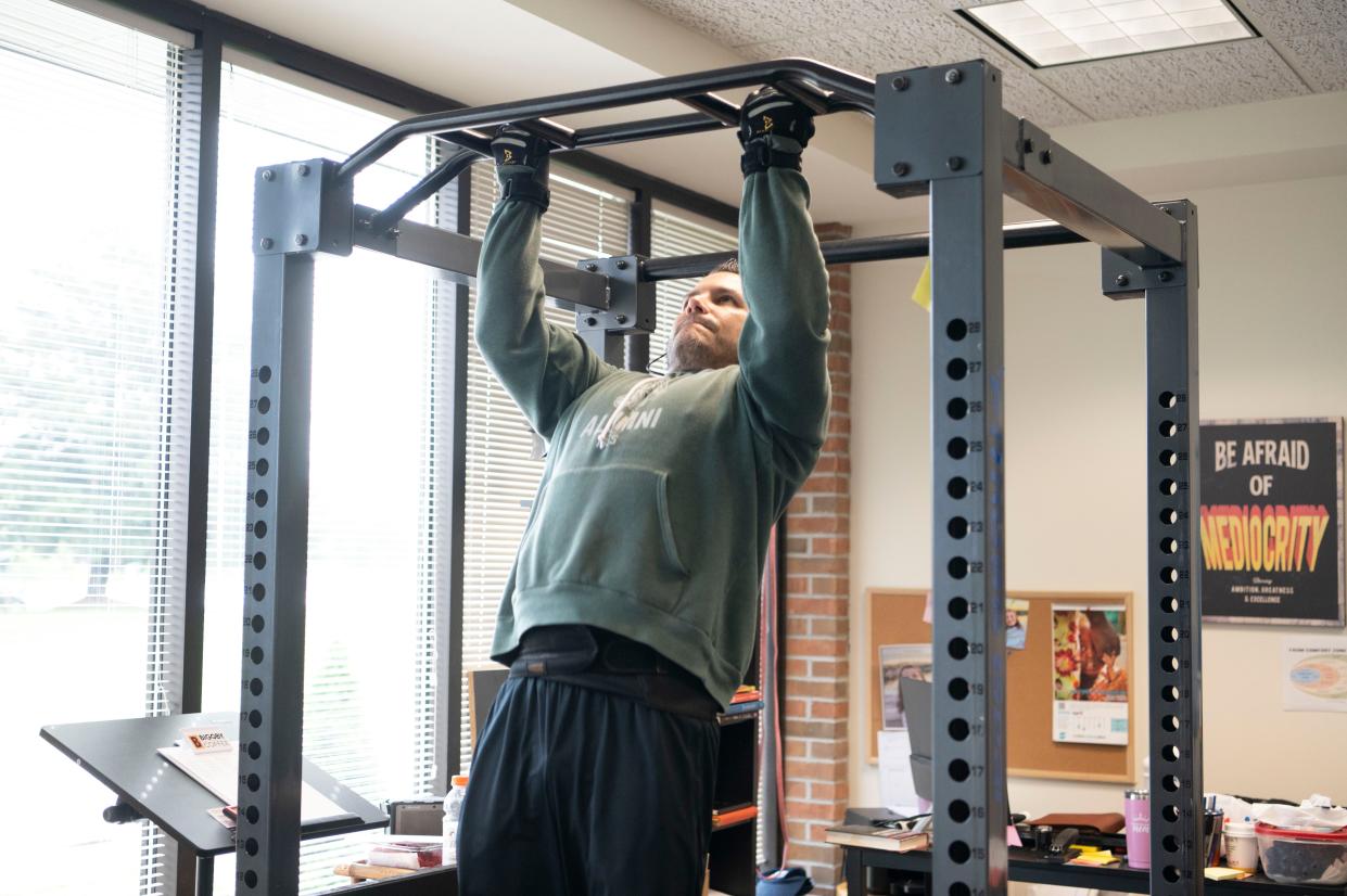 Charles Solano, owner of the five Biggby Coffee shops in the Battle Creek area, started at 7 a.m. on Friday at his Biggby Coffee location on Hill Brady Road, looking to break the world record for most chin ups in a 12-hour period, which is 4,649.