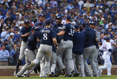 Oct 1, 2018; Chicago, IL, USA; The Milwaukee Brewers celebrate after defeating the Chicago Cubs in the National League Central division tiebreaker game at Wrigley Field. Mandatory Credit: Patrick Gorski-USA TODAY Sports