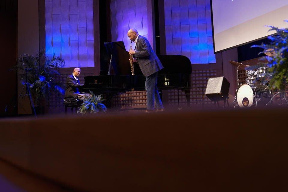 Branford Marsalis performs with pianist Dr. Michael Torregano, after Branford was introduced as the new artistic director for the Ellis Marsalis Center at The Musician's Village in New Orleans, Tuesday, Jan. 30, 2024. (AP Photo/Gerald Herbert)
